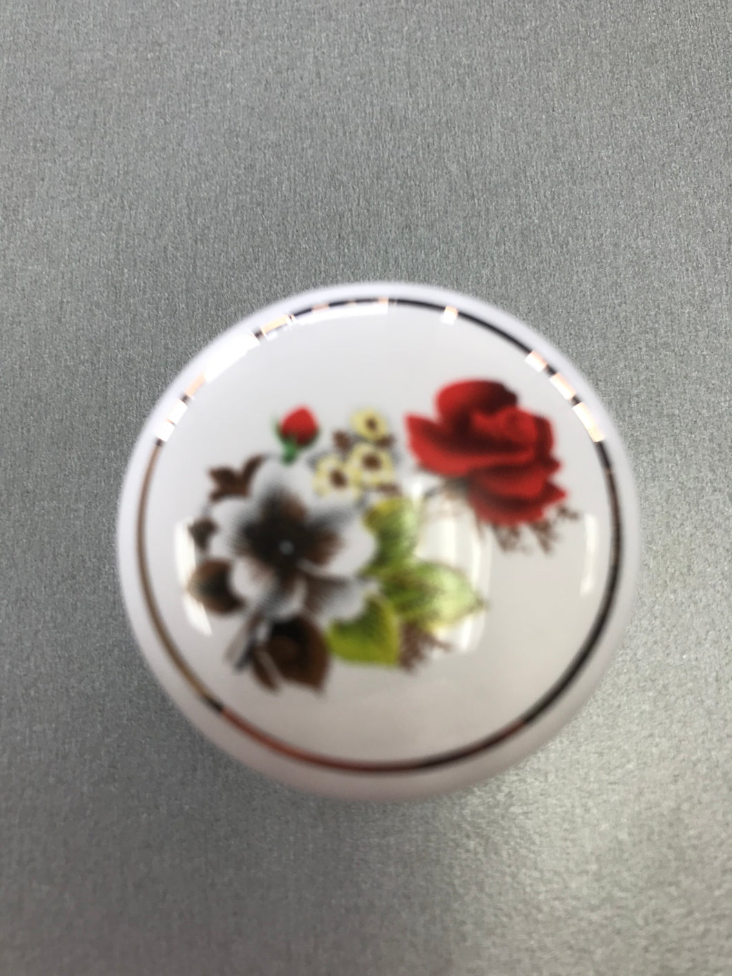 White Flower and Gold Knob